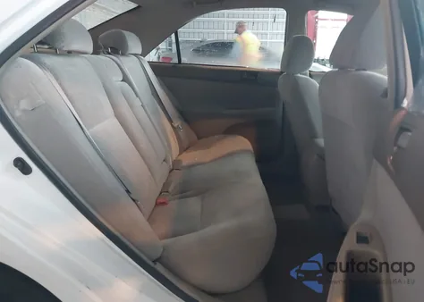 2003 Toyota Camry Le z USA, uszkodzony, nr VIN 4T1BE32KX3U146831